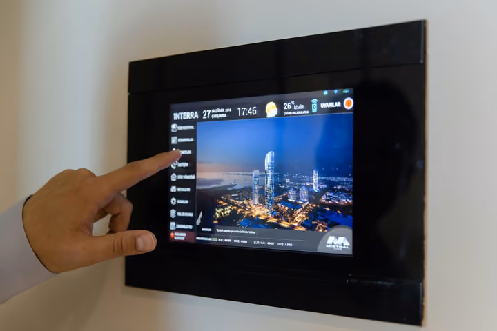 Smart home touchscreen inside an apartment.
