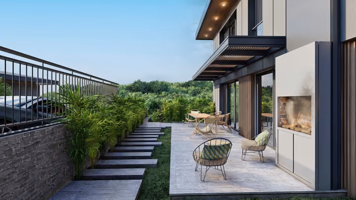 An outdoor terrace with seating and a fireplace beside a planted path. Architectural render supplied in the project source folder; it illustrates the proposed design.