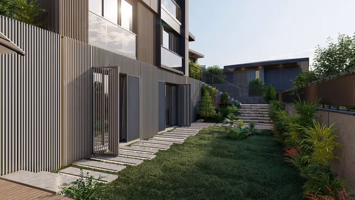 A planted garden path beside a villa and vertical boundary fence. Architectural render supplied in the project source folder; it illustrates the proposed design.