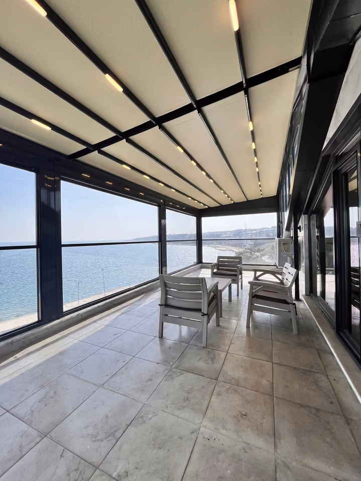 Enclosed terrace coastal view in the furnished seafront mansion in Buyukcekmece.