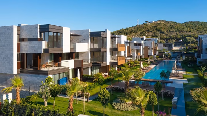 Elevated view of balconies gardens and swimming pool in Boyalik, Cesme.