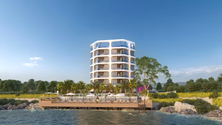 Architectural rendering of the building and waterfront deck from the sea