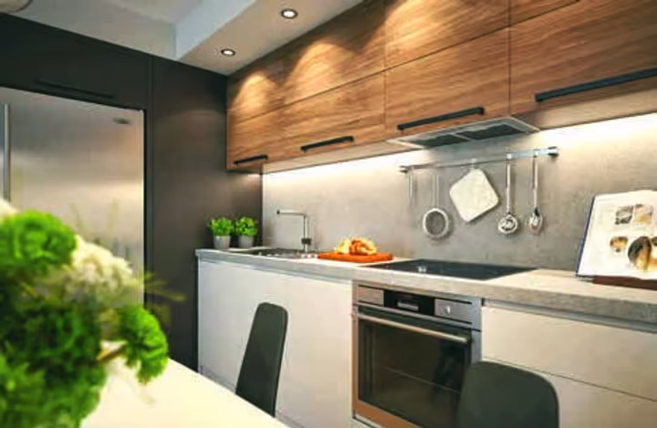 Interior visualization of kitchen cabinetry, built-in oven, hob and worktop.