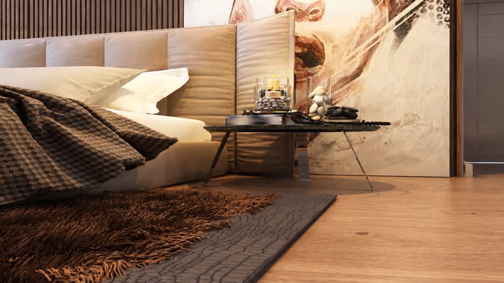 Interior rendering showing a double bed, bedside table, lighting and wall artwork.