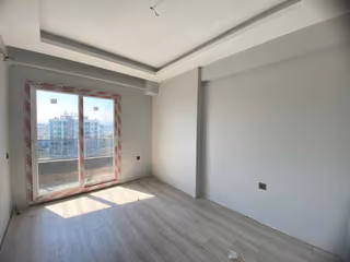 Tomuk unfurnished bedroom