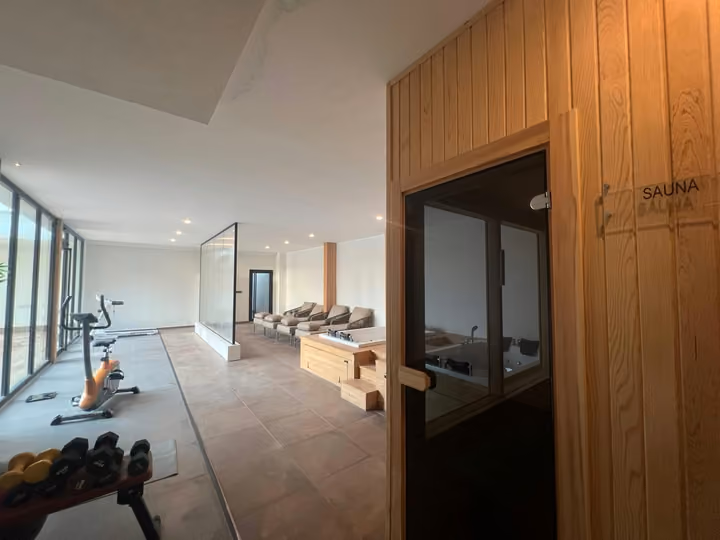Sauna entrance beside the fitness and relaxation area
