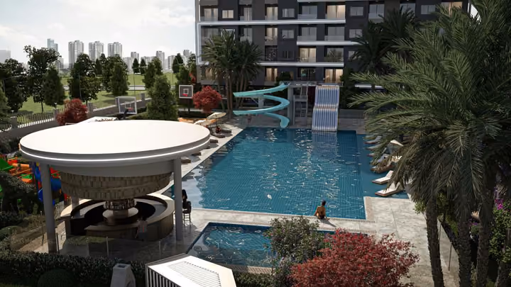Architectural visualisation of water slides beside the shared pool.