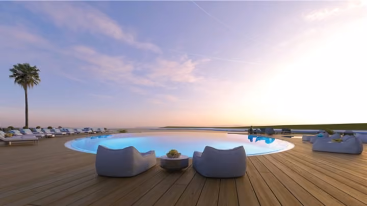 Architectural visualization of lounge chairs surrounding the pool at sunset.