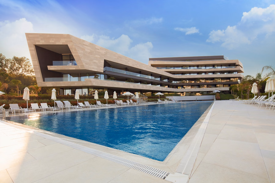 Terraced residences beside the outdoor pool.