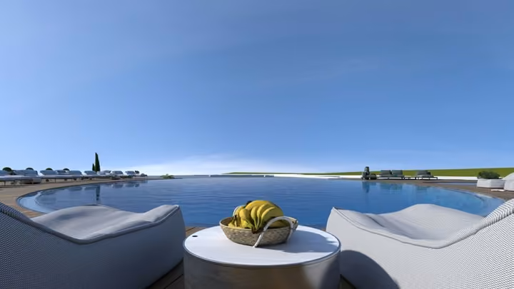 Architectural visualization of lounge seating beside the pool overlooking the sea.