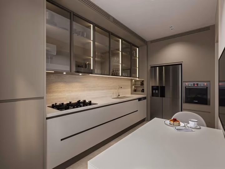 Illustrative kitchen interior with fitted cabinets and built-in appliances.