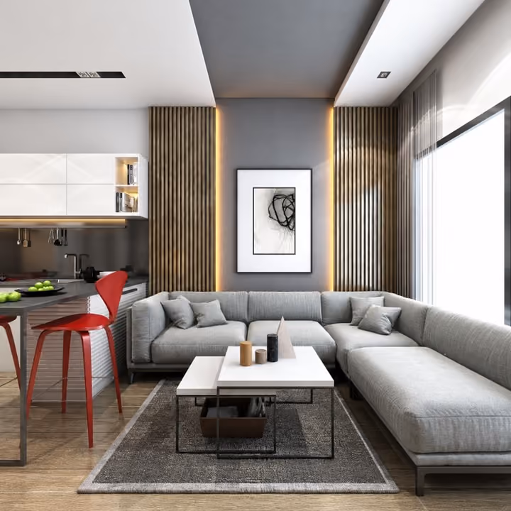 Interior rendering of a lounge beside an open kitchen and breakfast counter.