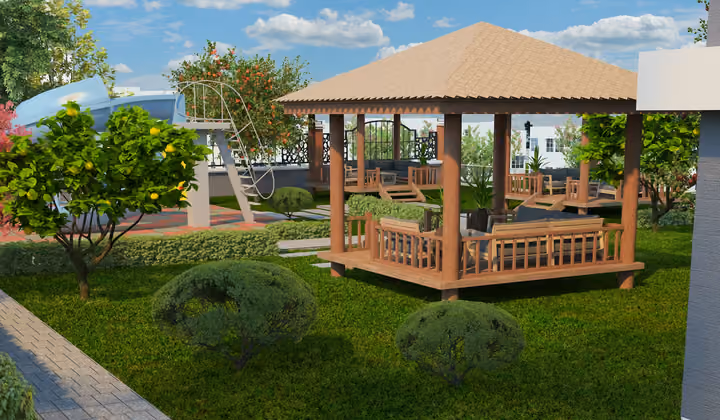 Landscaped garden with a wooden gazebo, paved path and play equipment.