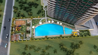Aerial architectural visualisation of the pool, sports court and playground.