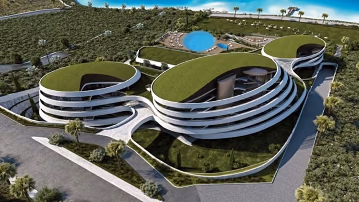 Architectural visualization of the curved building forms, planted roofs and pool area.