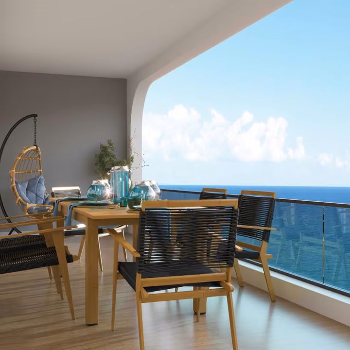 Architectural rendering of a balcony dining area facing the sea